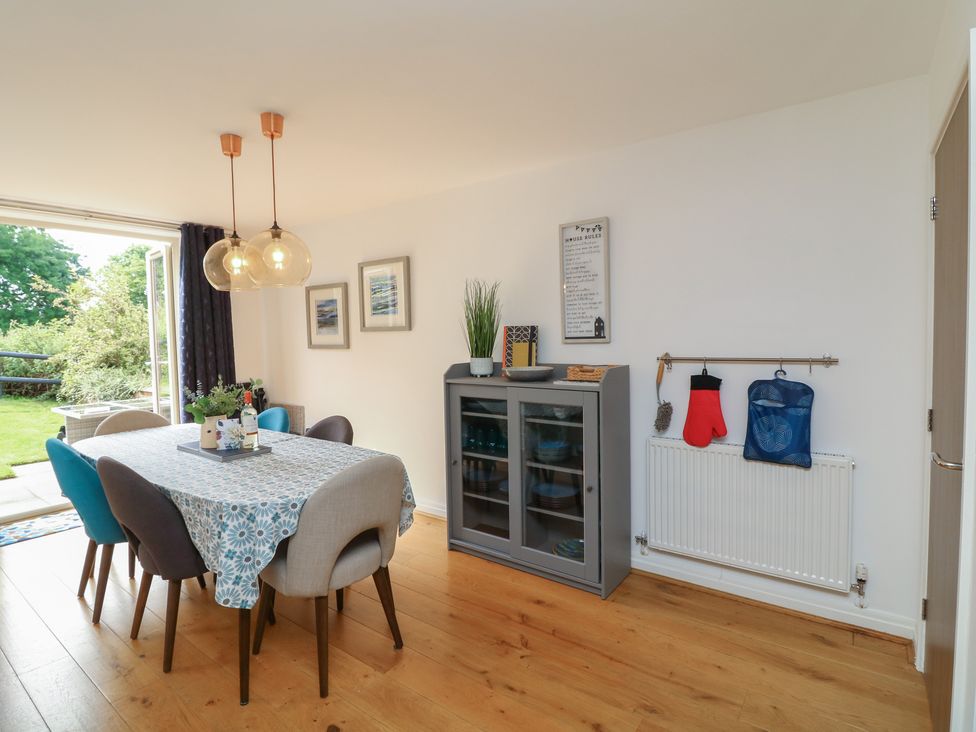 A dining room with a table and chairs at No 39 Ashbourne