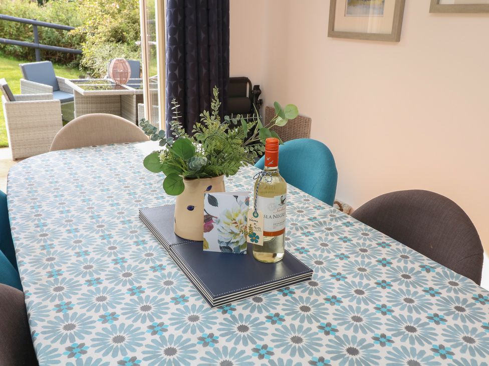 A dining room with a table set for drinks at No 39 Ashbourne
