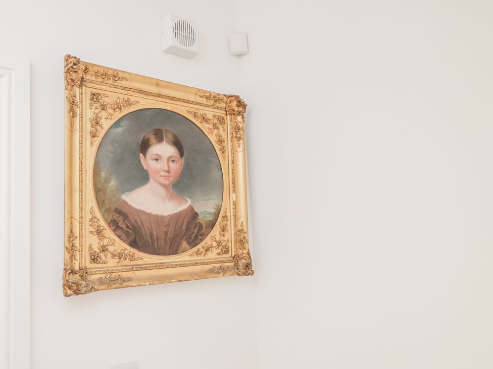 A portrait in a frame on the wall at 1 Castle Terrace