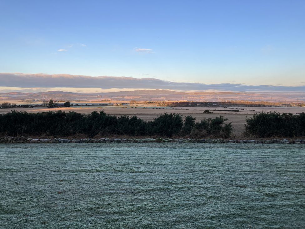 A view of fields and hills from Carnmhor in Aberdeen