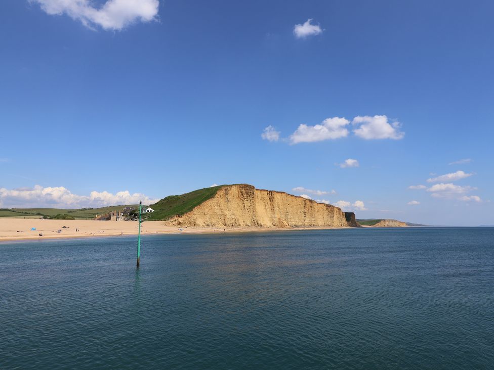 A beach view with cliffs and sea at Oakwood in Chideock