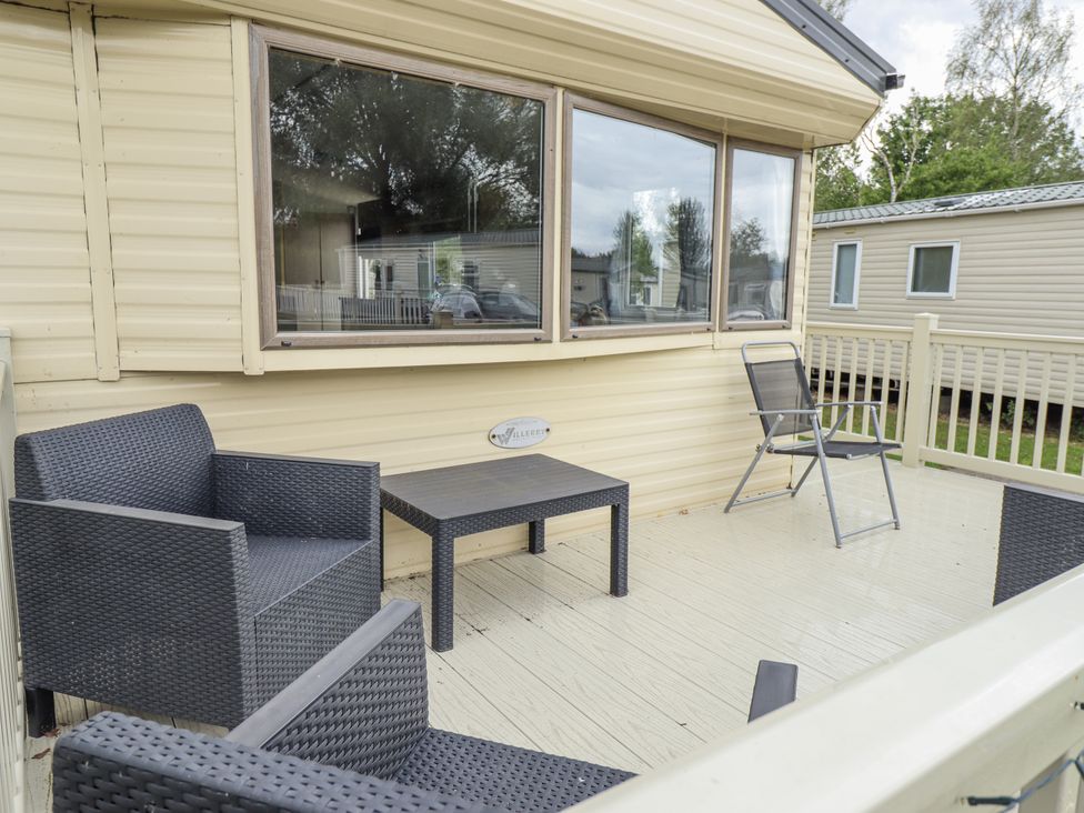 An outdoor seating area with chairs and a table at 31 Castle View, Lincoln