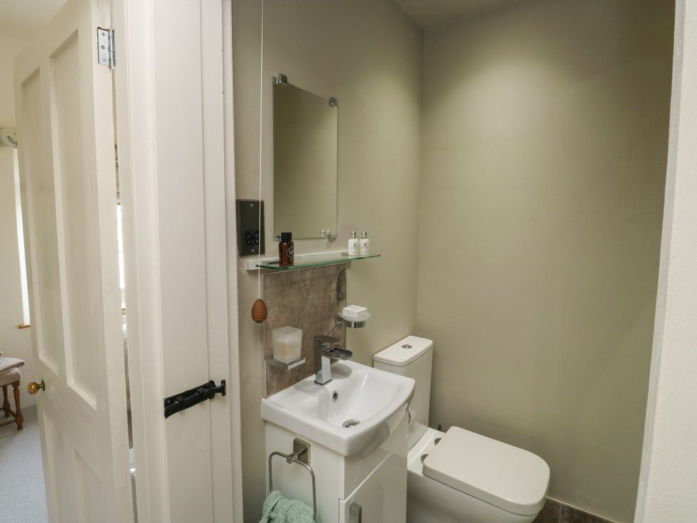 A bathroom with sink and toilet at 13 School Road Newton Abbot
