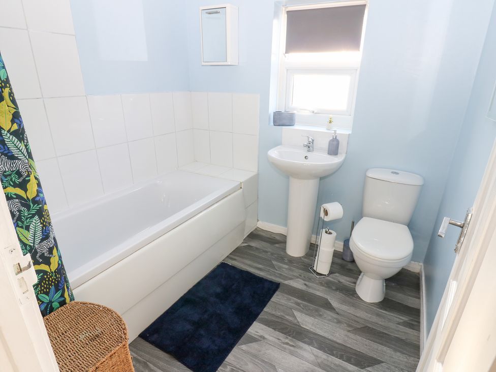 A bathroom with a sink, toilet, and bathtub at 16 Salvin Terrace Stockton-on-Tees