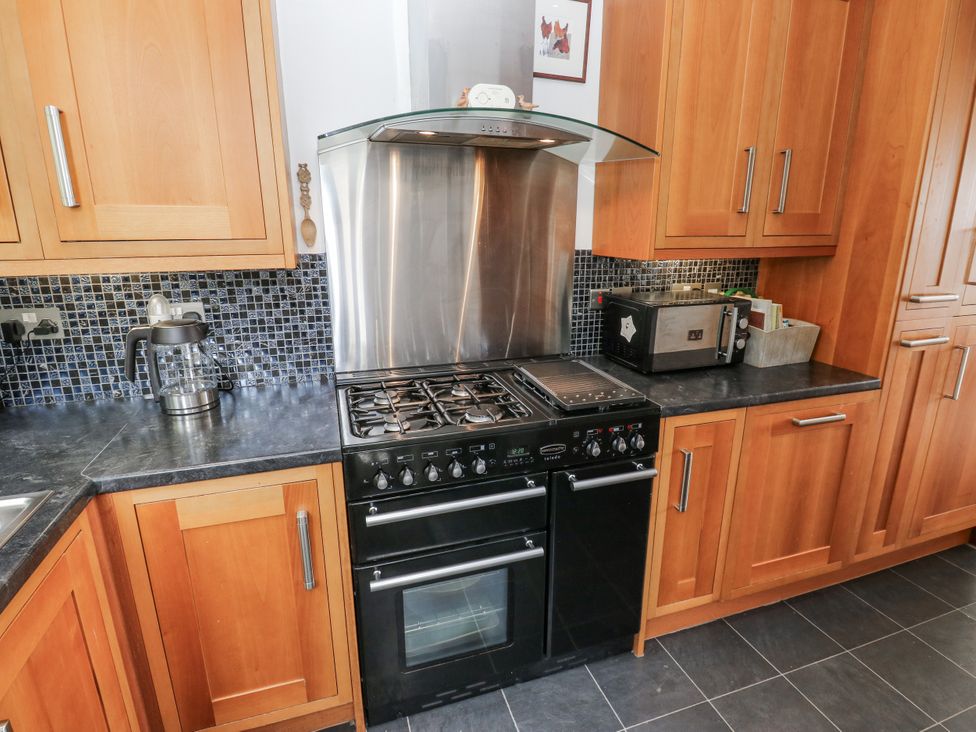 A kitchen with a stove and oven at The Vista in Hebden Bridge