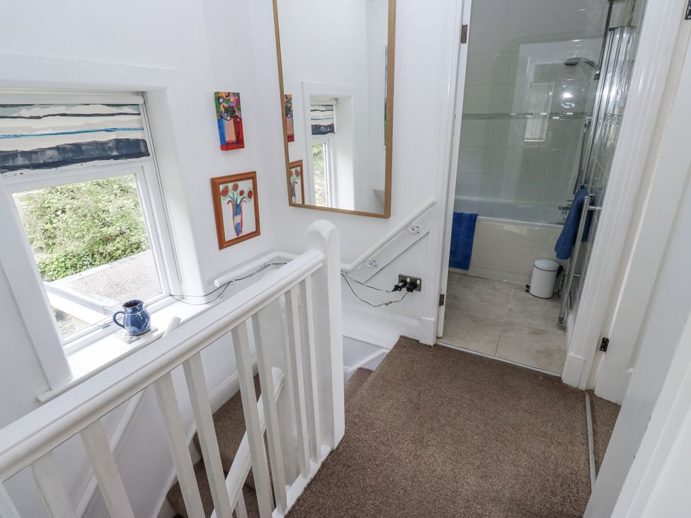 A stairway leading to a bathroom at The Vista in Hebden Bridge