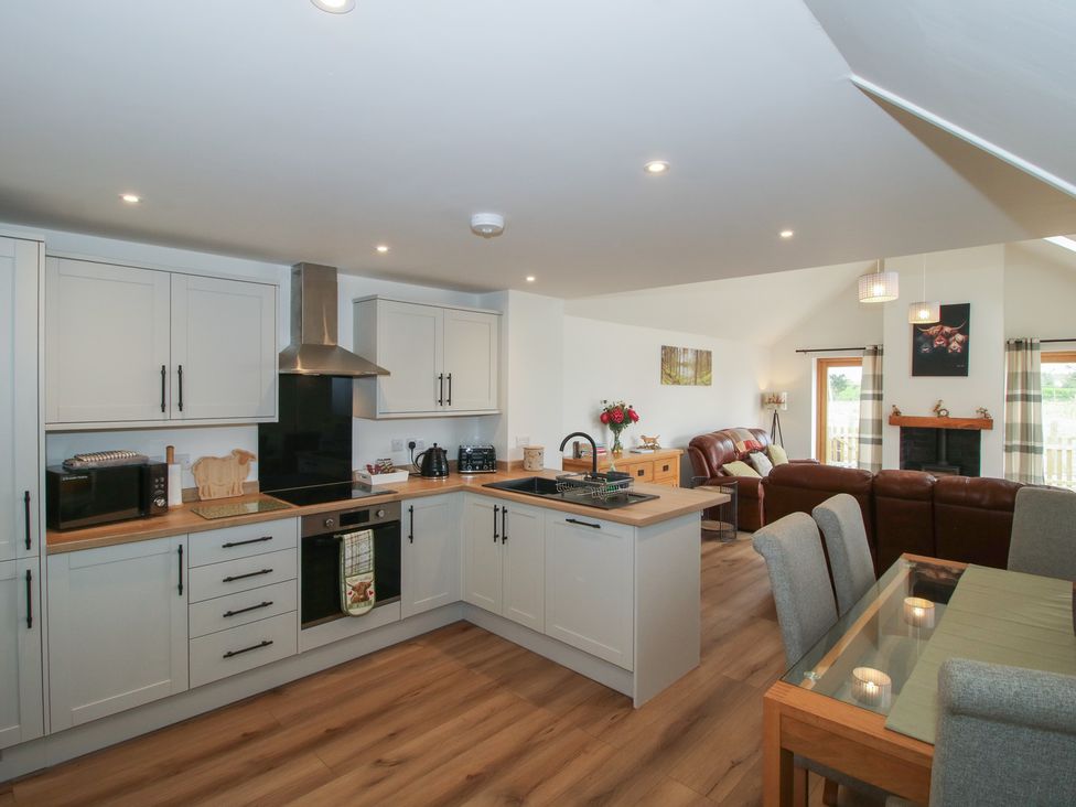 A kitchen and dining area at Chestnut Barn in Northwood near Wem