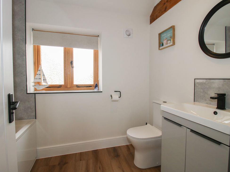 A bathroom with a sink and toilet at Chestnut Barn in Northwood near Wem