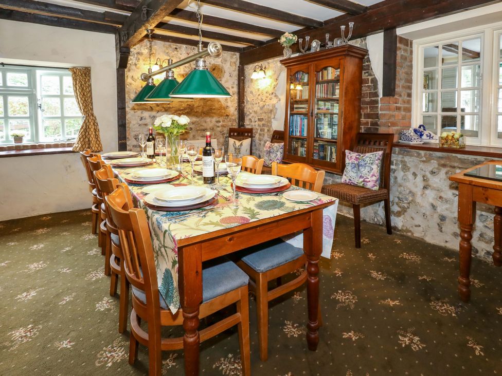 A dining room with a table set for dinner at Piddle Inn Piddletrenthide