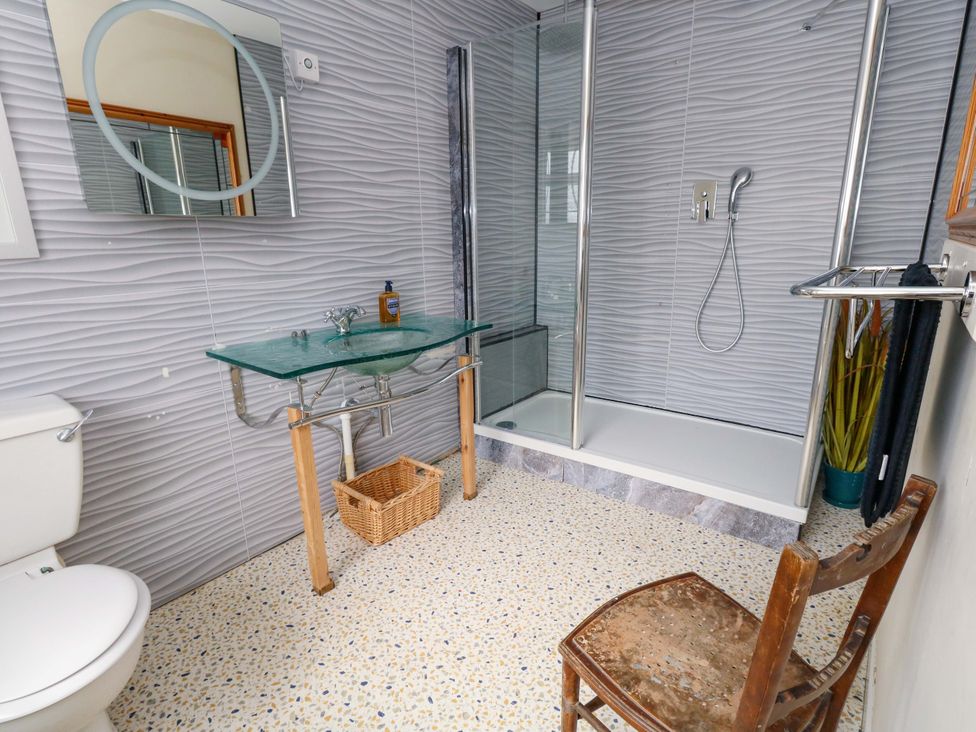 A bathroom with a shower and sink at Piddle Inn Piddletrenthide