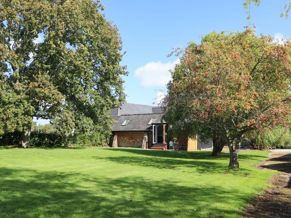A building surrounded by trees and grass at The Old Parlour Southampton