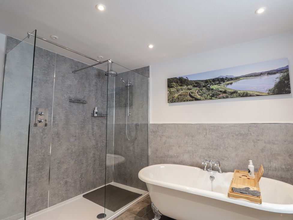 A bathroom with shower and bathtub at Sron Dubh in Achnasheen