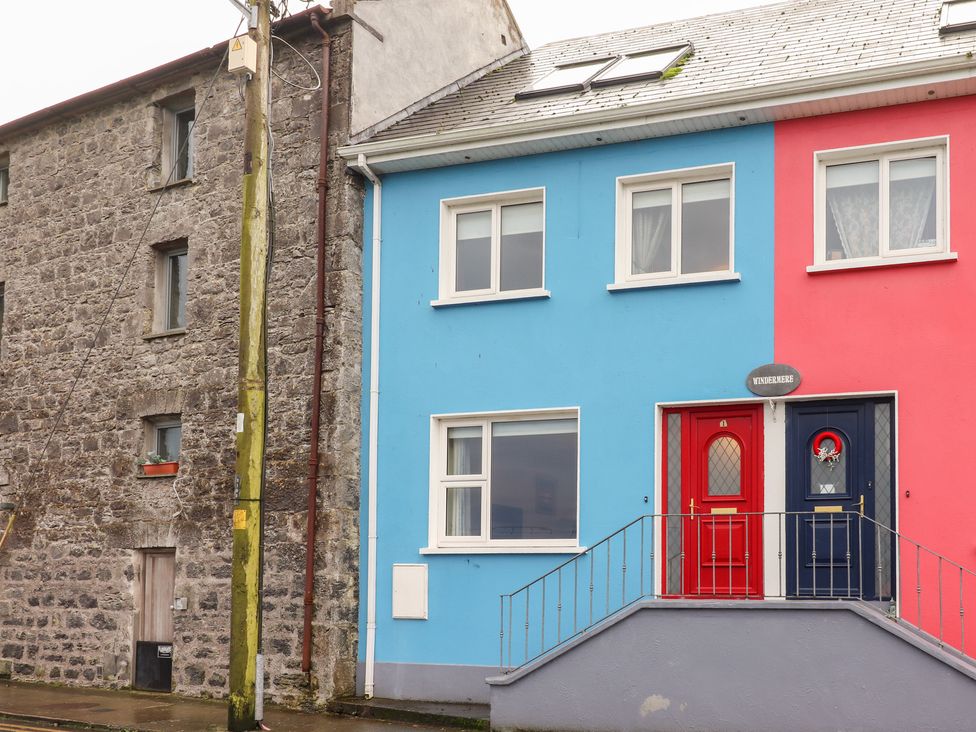 A house with blue and red doors at 1 Windermere in Kinvarra