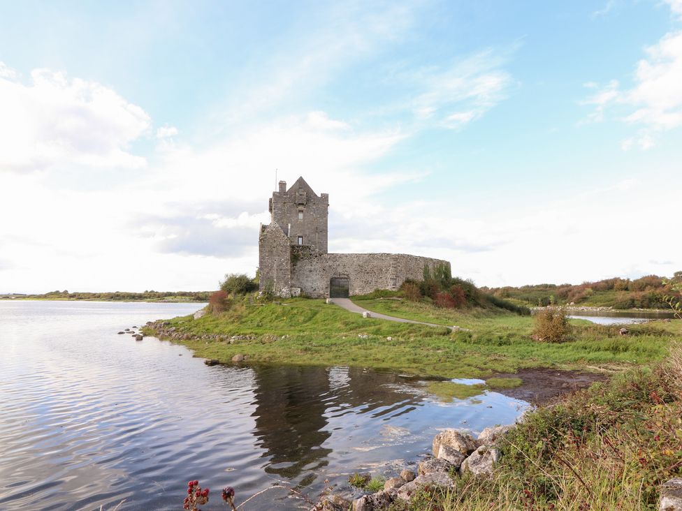 A castle near a body of water at 1 Windermere in Kinvarra