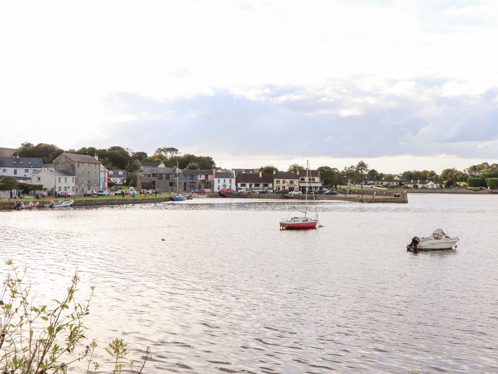 A view of boats on water near houses at 1 Windermere in Kinvarra