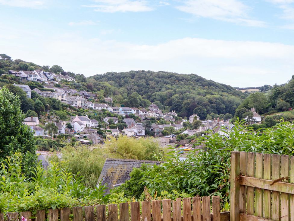 A view of houses on a hillside at The Porthole in Newton Ferrers