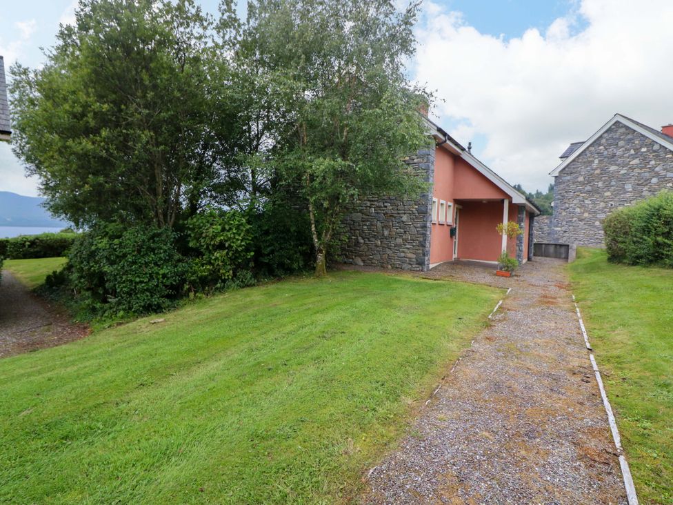 A house with a pathway in front at 25 Ring of Kerry Holiday Cottages Kenmare