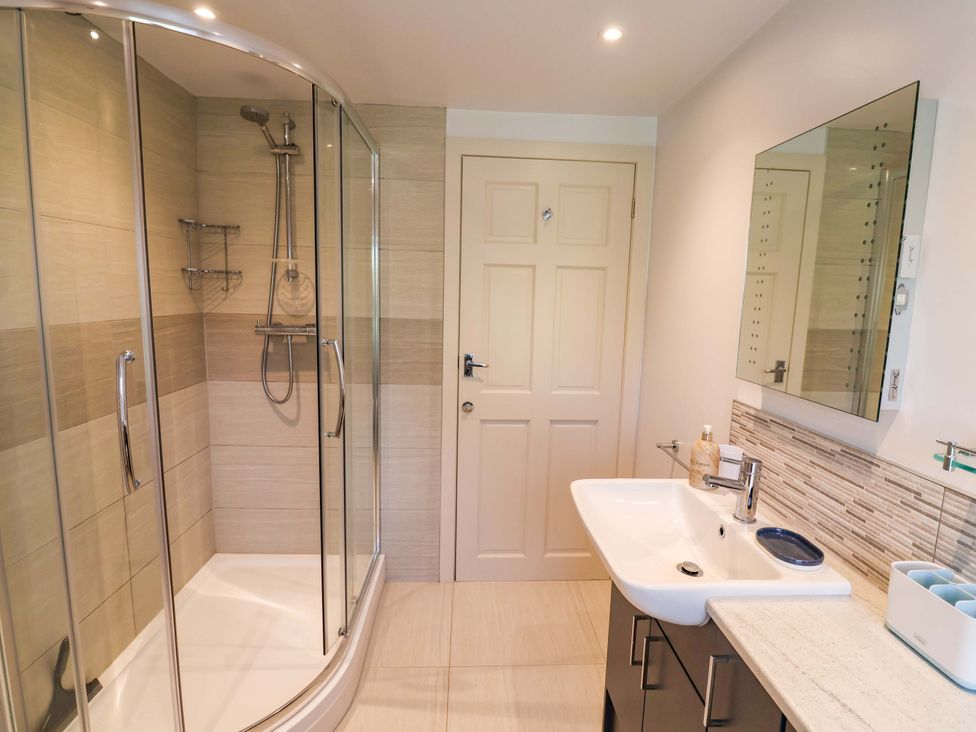 A bathroom with a shower and sink at The Cottage Middle Westwater in Westwater Nr Axminster