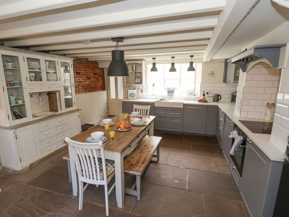 A kitchen with table and chairs at Greenfingers in Whitby