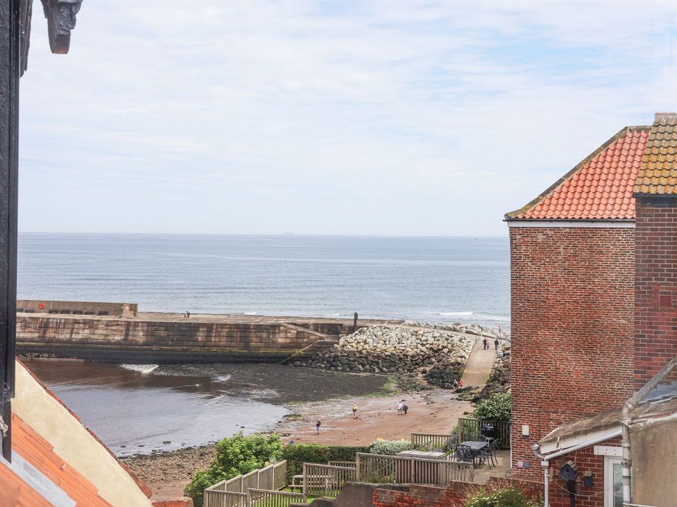 A view of the harbor and pathway at Greenfingers in Whitby