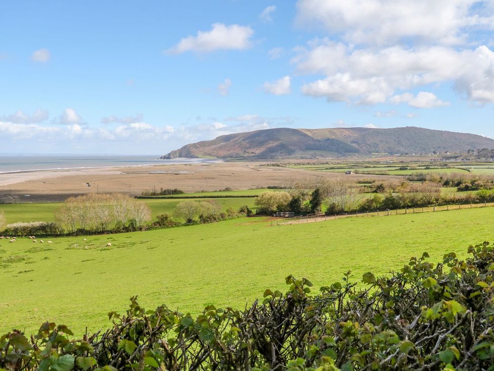 A landscape view of fields and hills at Woodedge Minehead