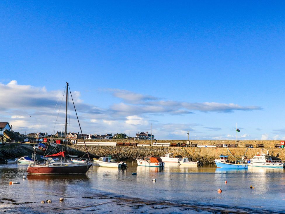 A view of boats in a harbour at 2 Harbour Lights Cemaes Bay