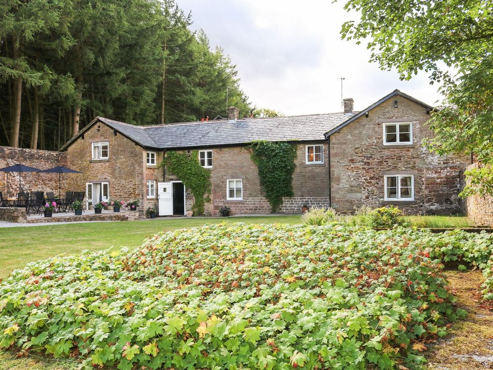A house with garden and patio area at The Bothy in Wildboarclough