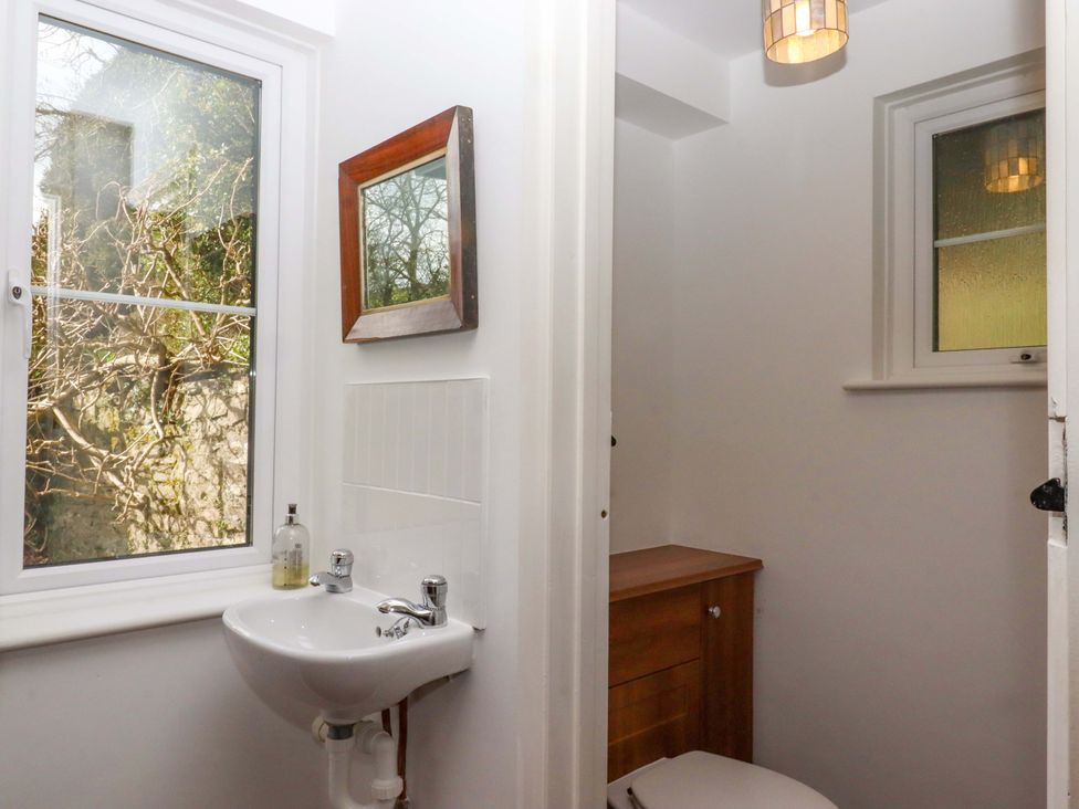 A bathroom with a sink and toilet at Town Farm Cottage in Barnstaple