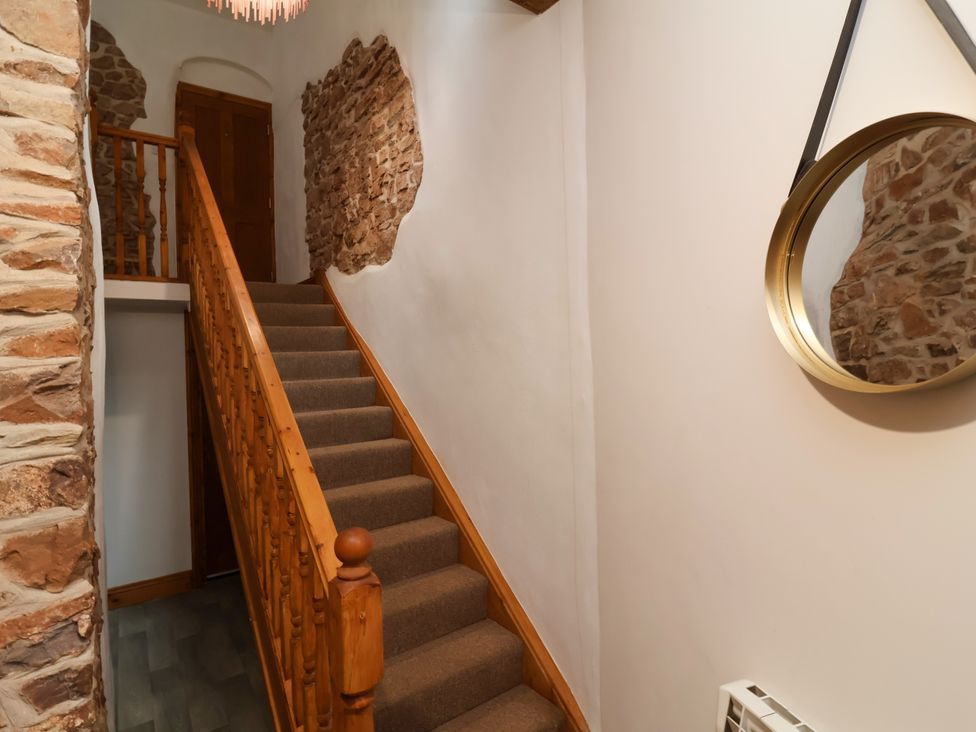 A staircase in a hallway at Baywatch (St. David's View) Lynton