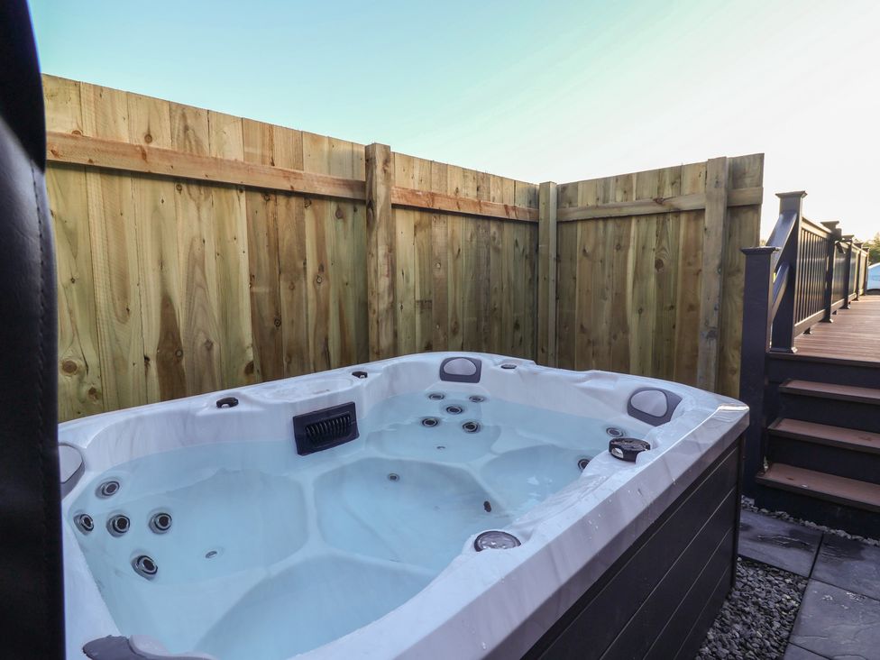 A hot tub in an outdoor space at Meadows Park 2 Great Hatfield near Hornsea