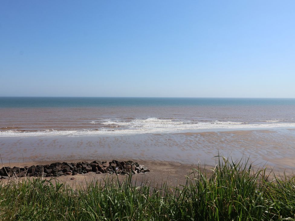 View of the ocean and shoreline at Meadows Park 4 Great Hatfield near Hornsea