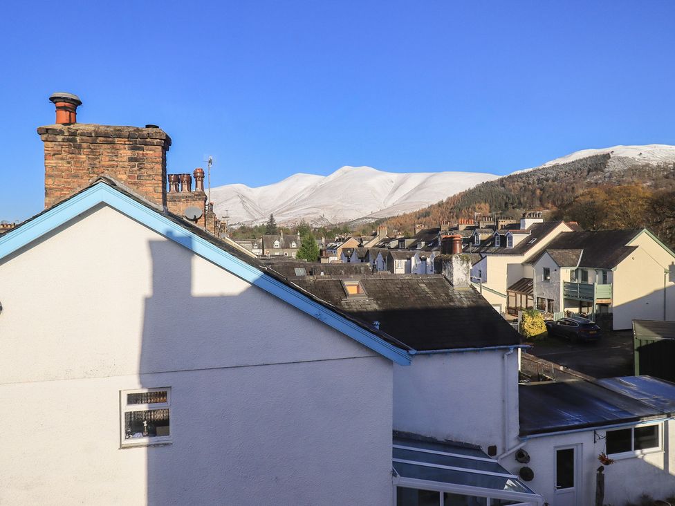 A view of rooftops and mountains at Swirl Howe in Keswick