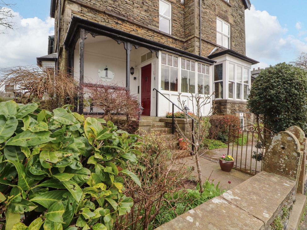 A house entrance with steps and a gate at 1 Park Road in Windermere