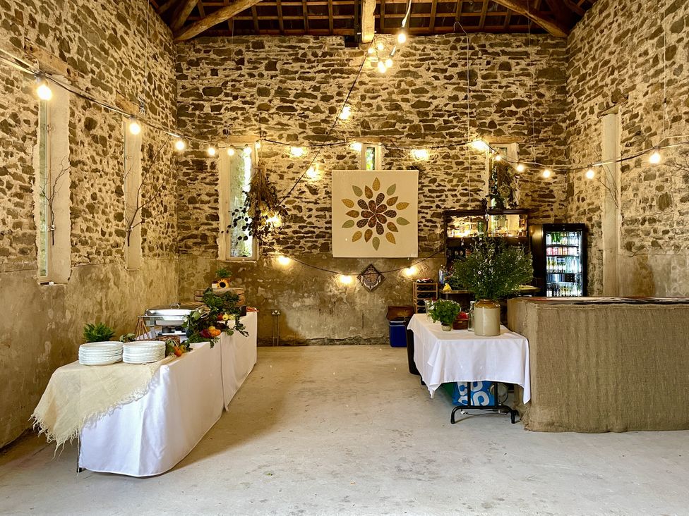 An event space with tables and decorations at West Cottage Myddfai near Llandovery