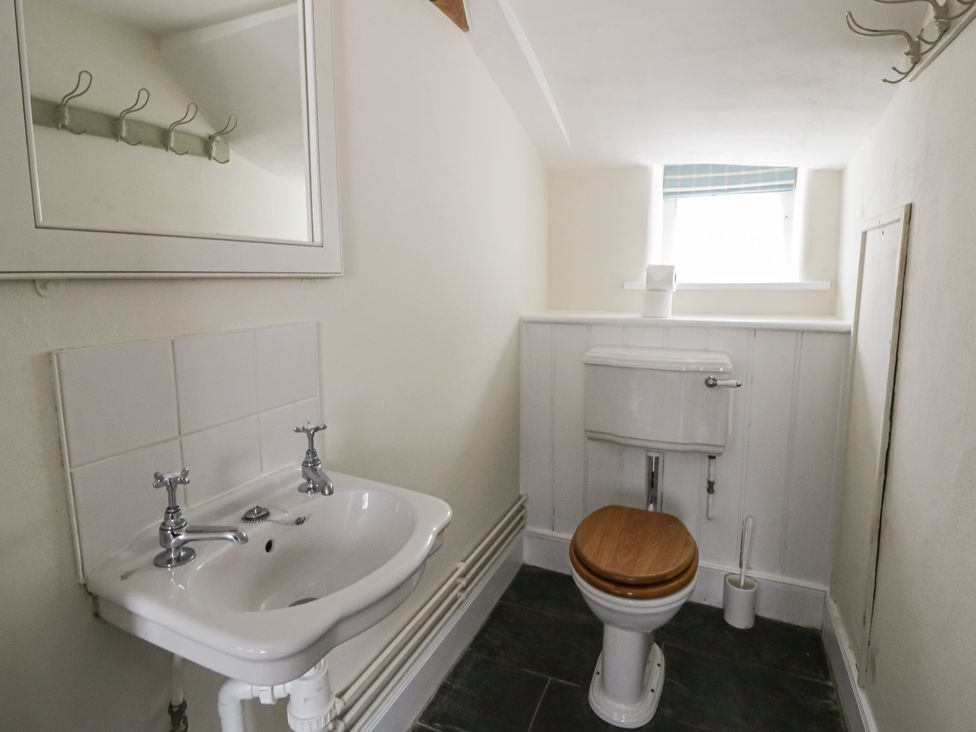 A bathroom with sink and toilet at Gatekeepers Cottage Myddfai near Llandovery