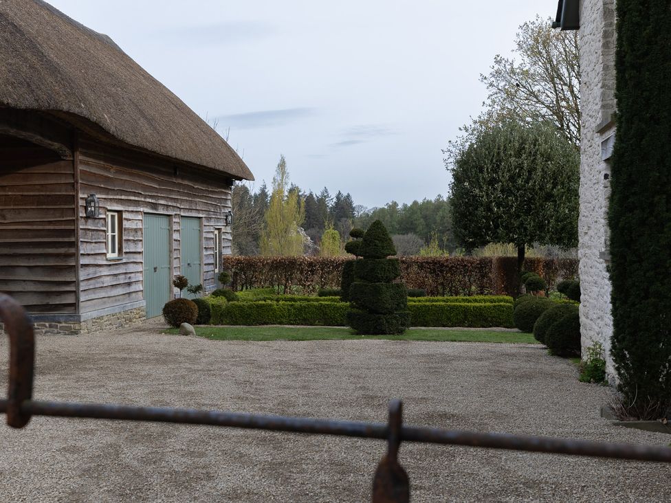 A barn and landscaped garden at Gatekeepers Cottage near Llandovery