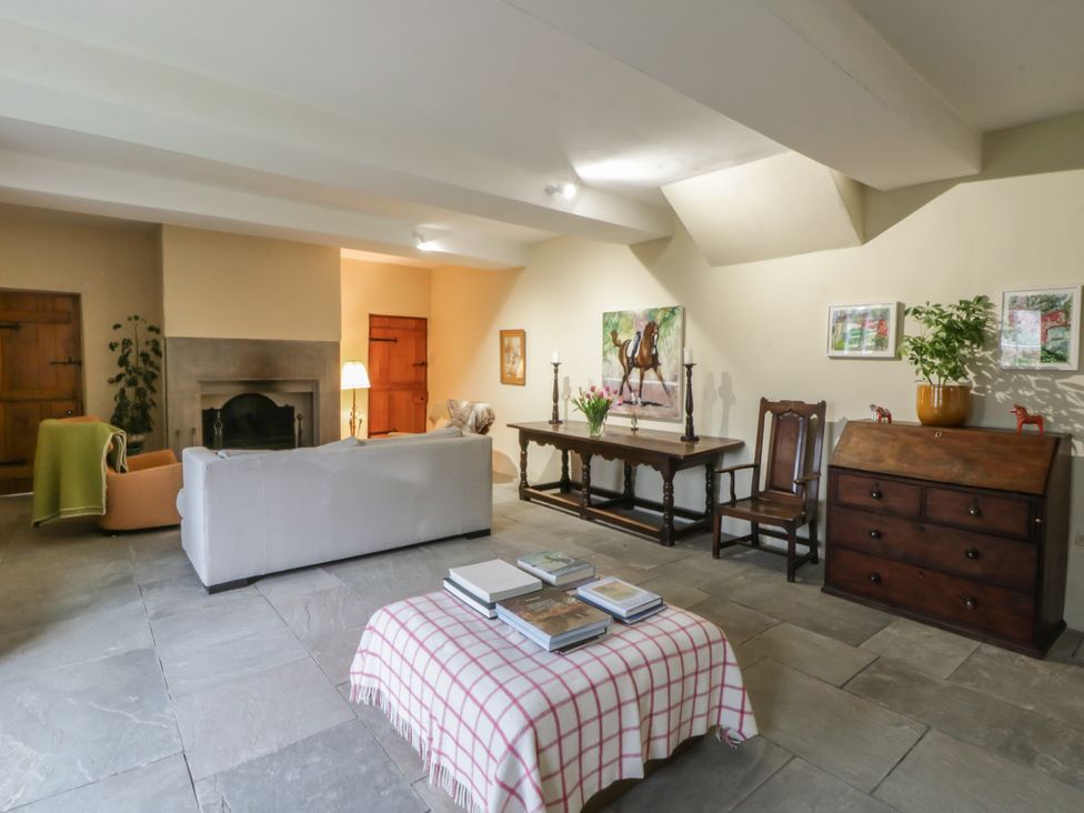 A living room with a sofa and coffee table at North Cottage Llandovery