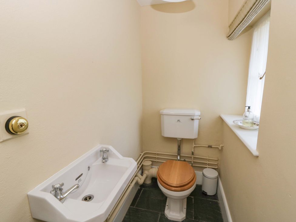 A bathroom with a sink and toilet at North Cottage in Myddfai near Llandovery