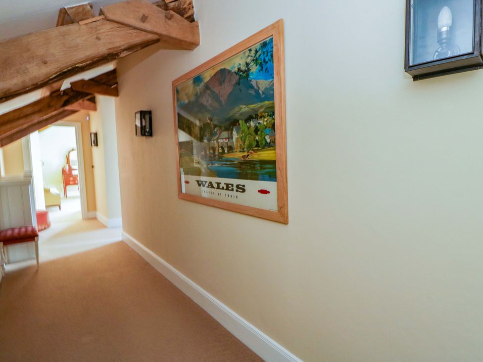 A hallway with a picture on the wall at North Cottage Myddfai near Llandovery