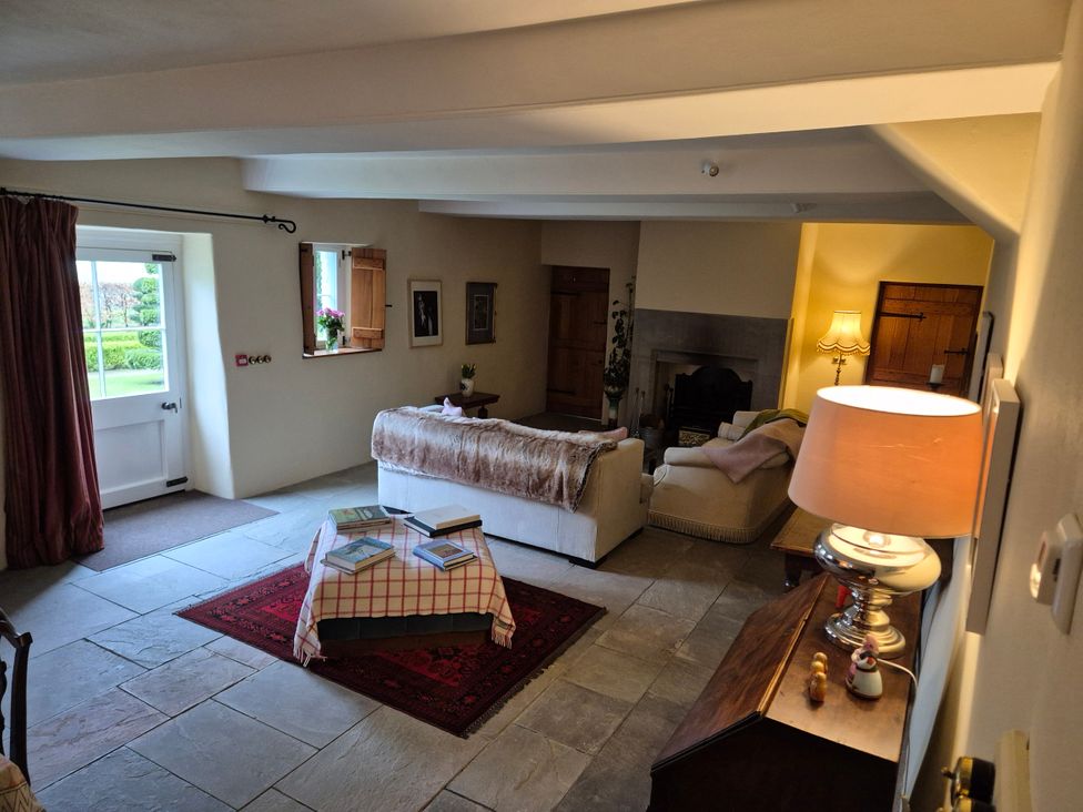 A living room with a sofa and coffee table at North Cottage Myddfai near Llandovery
