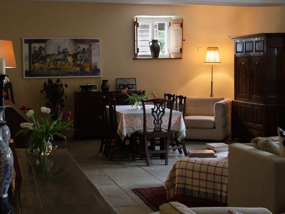 A dining room with a table and chairs at North Cottage Myddfai near Llandovery