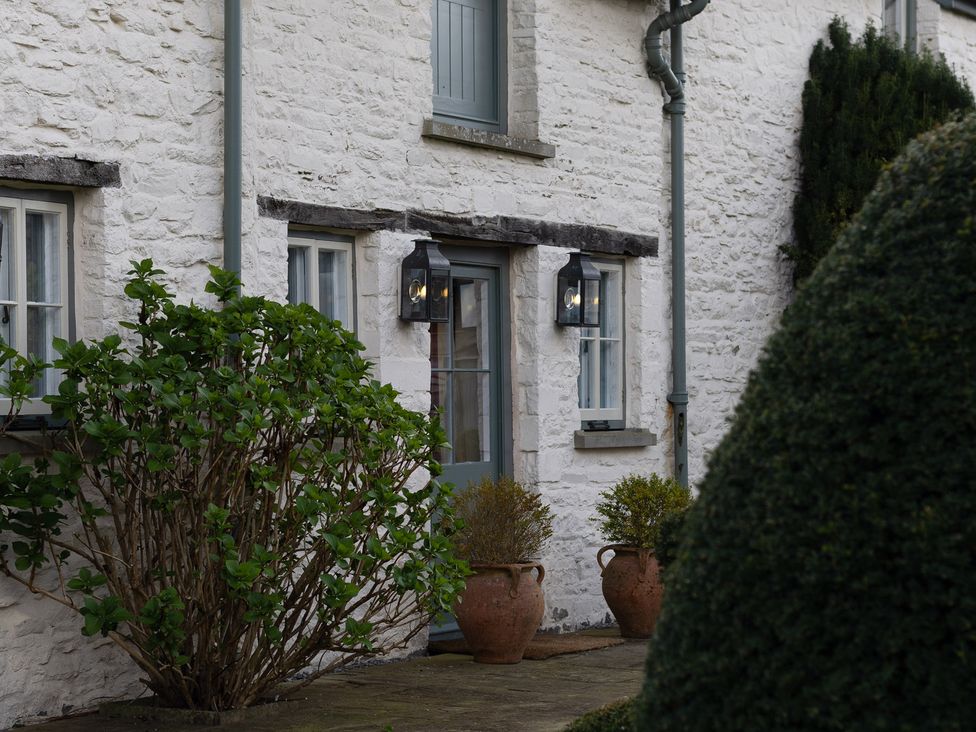 An outdoor view of a house with windows and plants at North Cottage Myddfai near Llandovery
