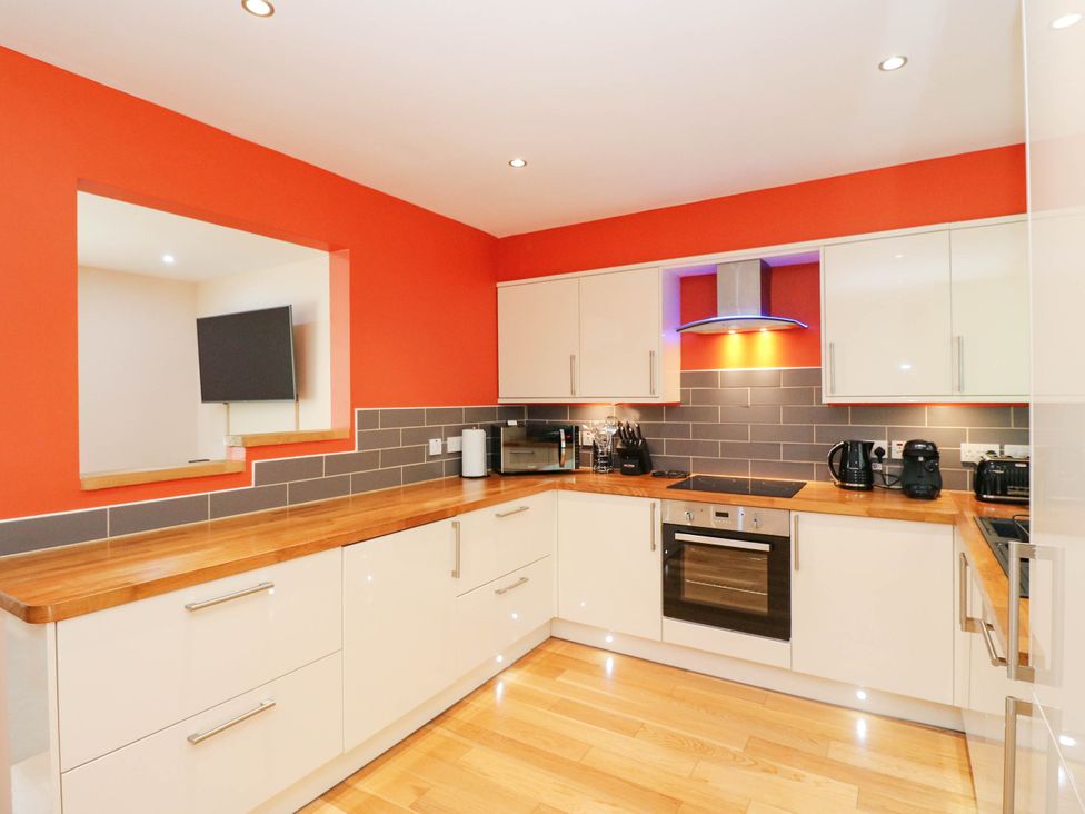 A kitchen with appliances and countertop at 1 Balnakeil in Dunbeg