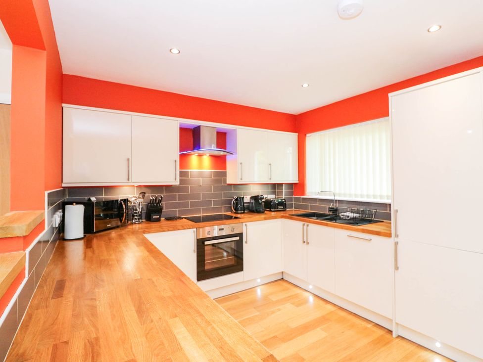A kitchen with appliances and countertop at 1 Balnakeil in Dunbeg