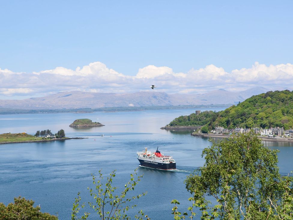 A landscape view featuring a ship and islands at 1 Balnakeil in Dunbeg