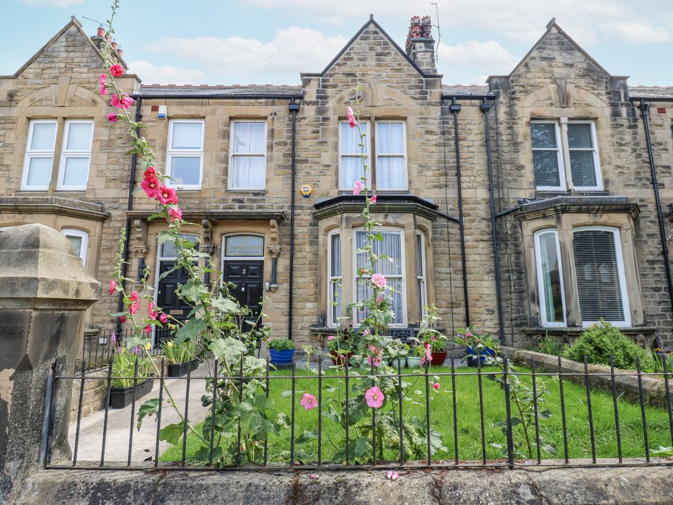 A house with flowers and a garden at St Ronans in Bishop Auckland