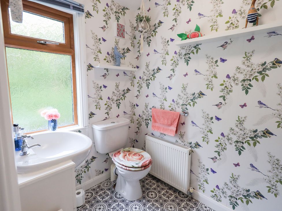 A bathroom with a sink and toilet at Charnwood