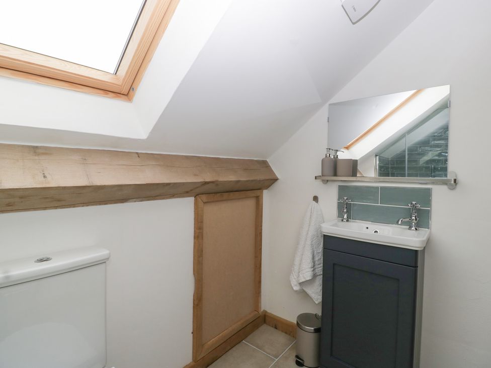 A bathroom with a sink and toilet at Two Parks Barn Upton Bishop near Ross-On-Wye