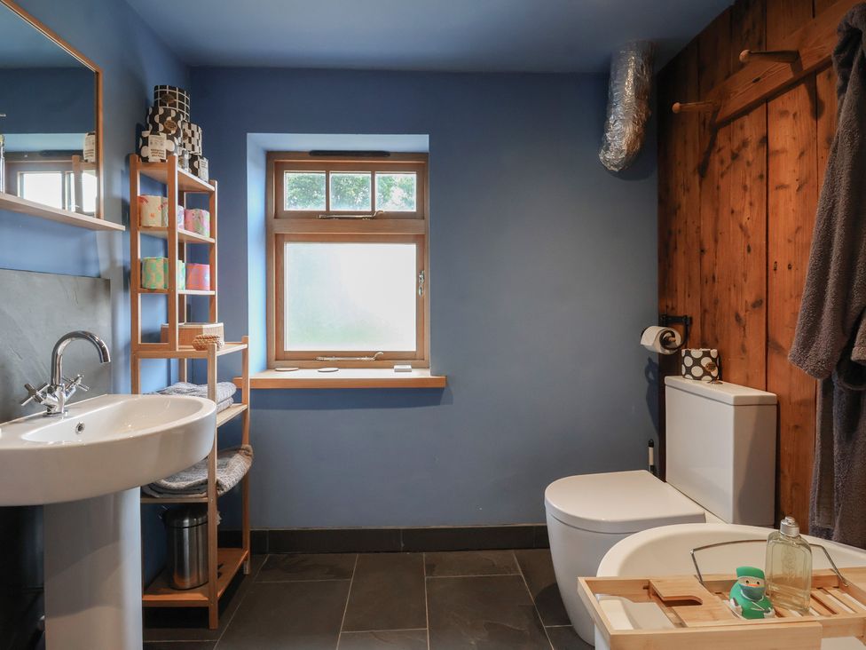 A bathroom with a sink and toilet at The Annex at Manor Farm