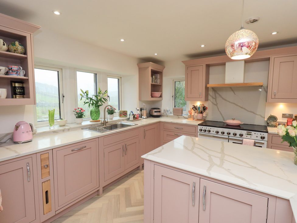 A kitchen with a countertop and stove at Hallbeck in Buckden
